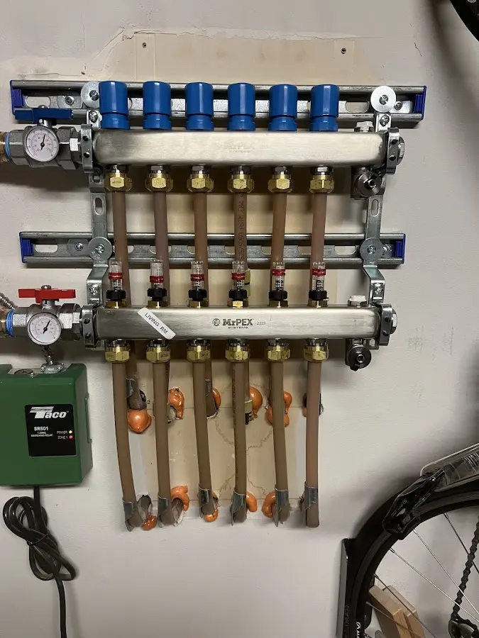 Plumber performing Gas Line Installation at a residential property in Collinsville